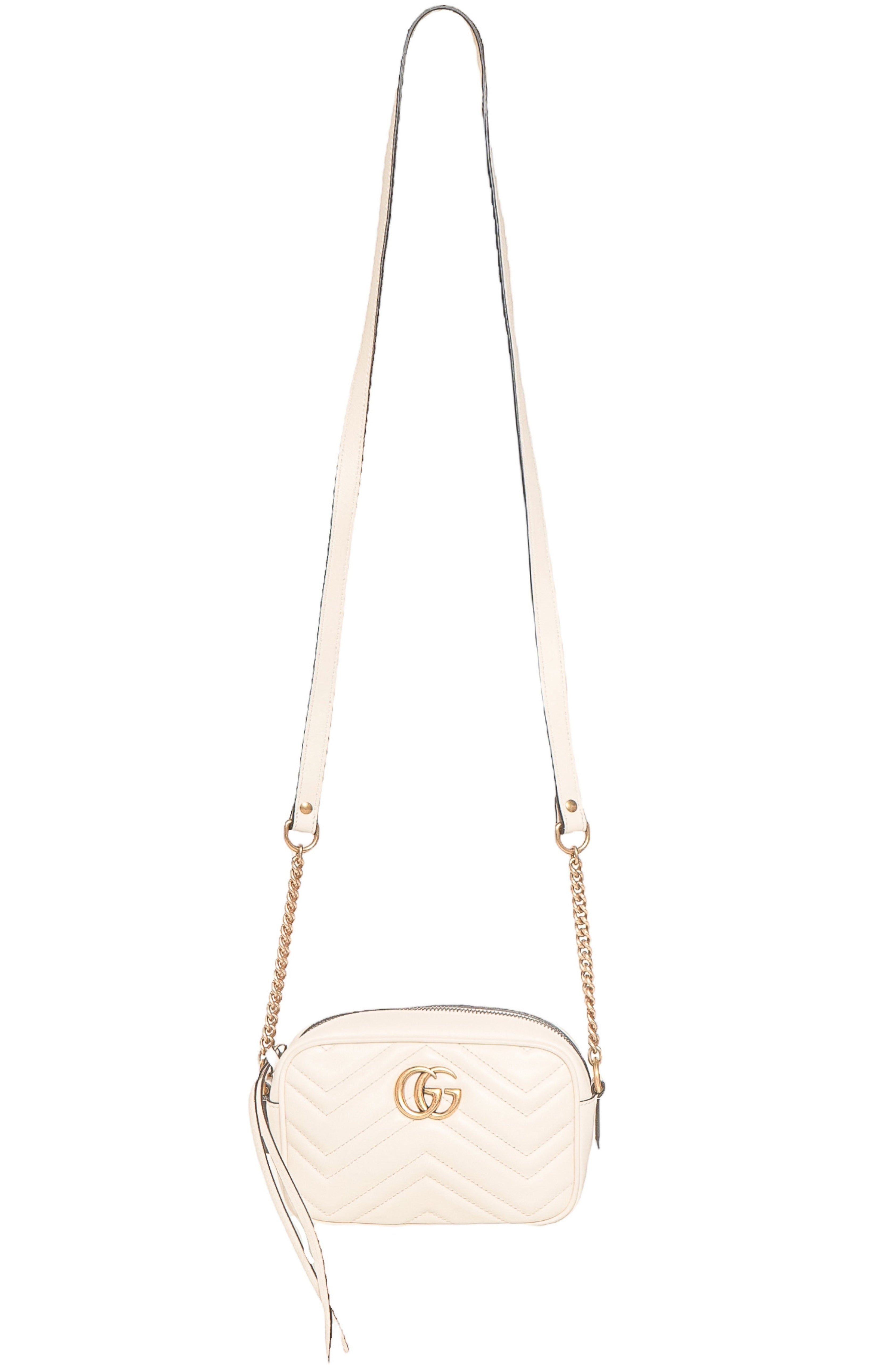 GUCCI Bag Size: 7" x 2.375" x 4.625"; 24" strap