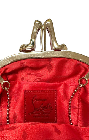 CHRISTIAN LOUBOUTIN (RARE) Bag Size: 7" x 1.75" x 4.75"; 1.375" handle
