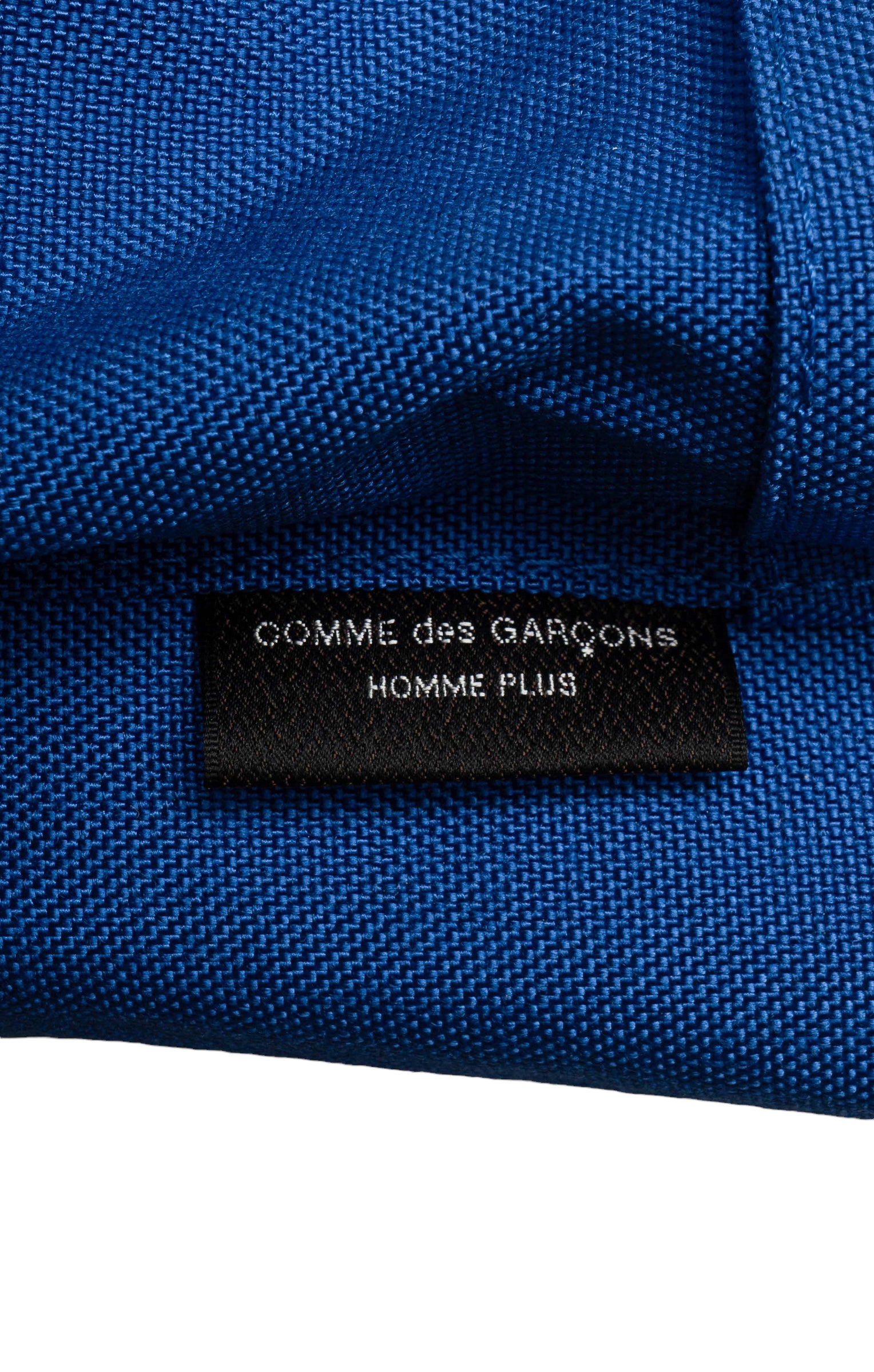 COMME DES GARÇONS Backpack Size: 10.5" x 6" x 17.5"; 2.5" drop handle