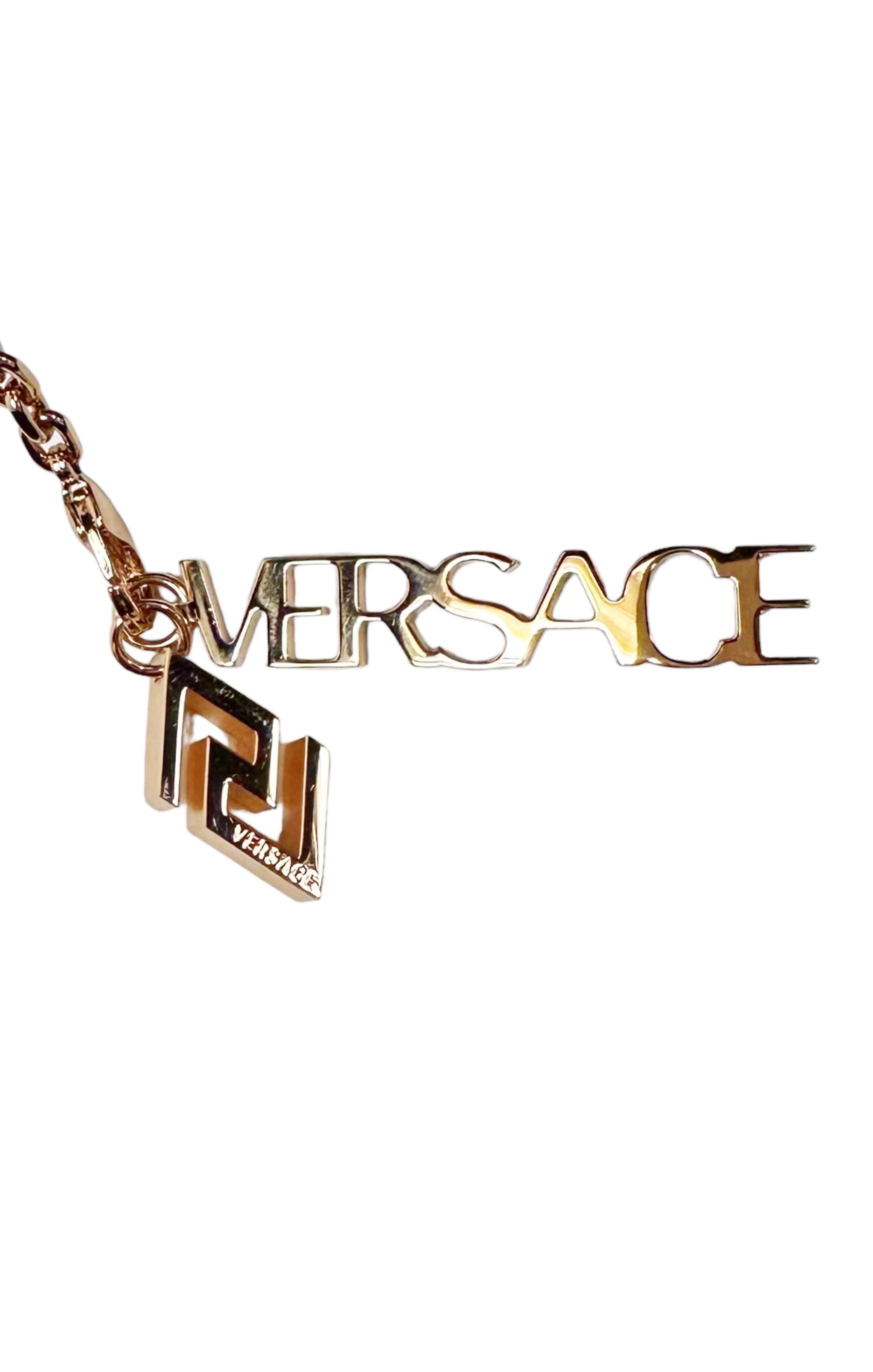 VERSACE (RARE & NEW) with tags Bag Size: 12.5" x 2.375" x 9.75"; 8.25" drop handle