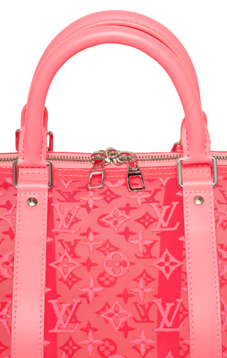 LOUIS VUITTON (RARE) Luggage Size: 21" x 8.625" x 11"; 4" drop handle