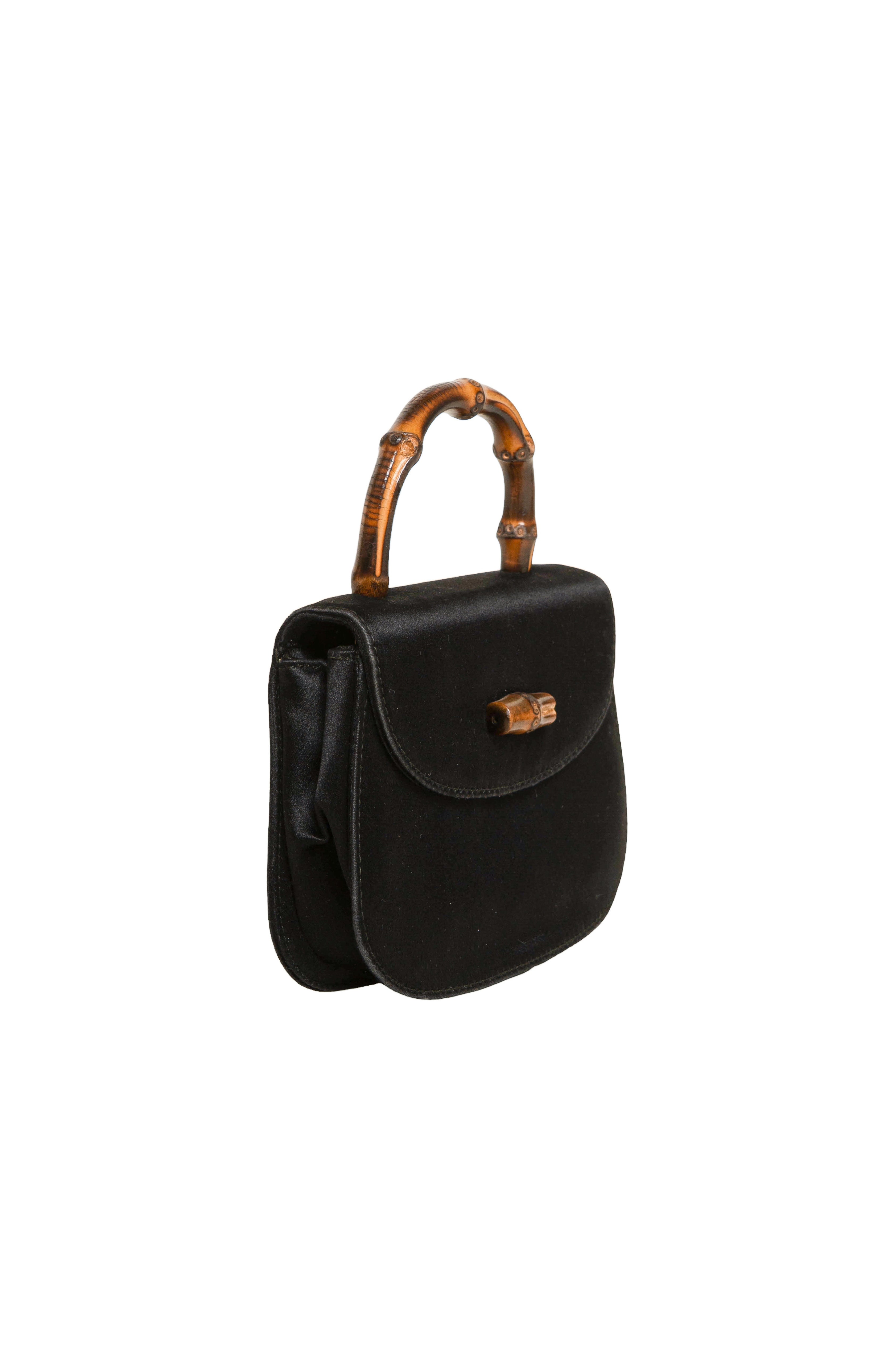 VINTAGE GUCCI (RARE) Bag Size: 5.5" x 1.5" x 4"; 1.75" drop handle