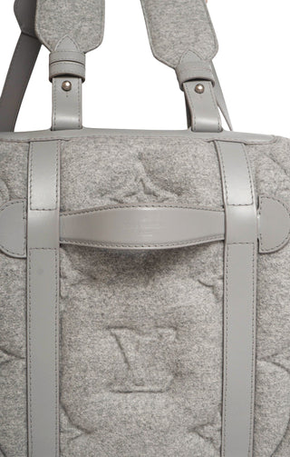 LOUIS VUITTON (RARE) Luggage Size: 23.5" x 7.75" x 26"; 33" straps